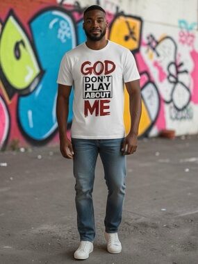 White Short-Sleeve Graphic Tee with “God Don’t Play About Me” P2P is 21